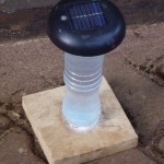 Students invent base to secure solar reading lights