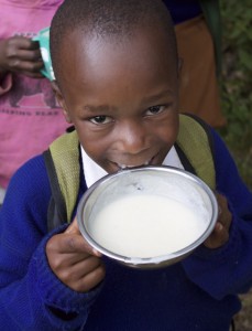 child with porridge